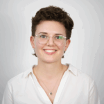 A profile photo of the student author, Lara Kauter wearing glasses and smiling.