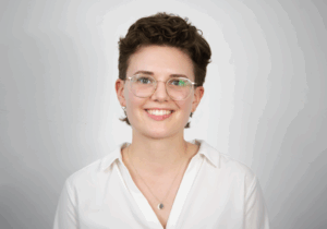 A profile photo of the student author, Lara Kauter wearing glasses and smiling.